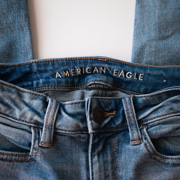 AMERICAN EAGLE Blue Distressed Frayed Hem Jegging Jeans - Size 0 - Picture 5 of 13